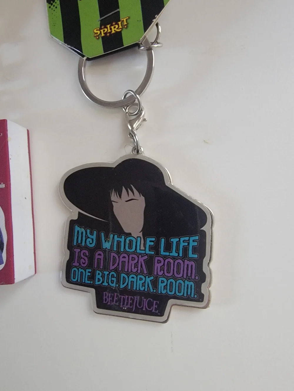 Green & Black Keychain with Red Book Charm